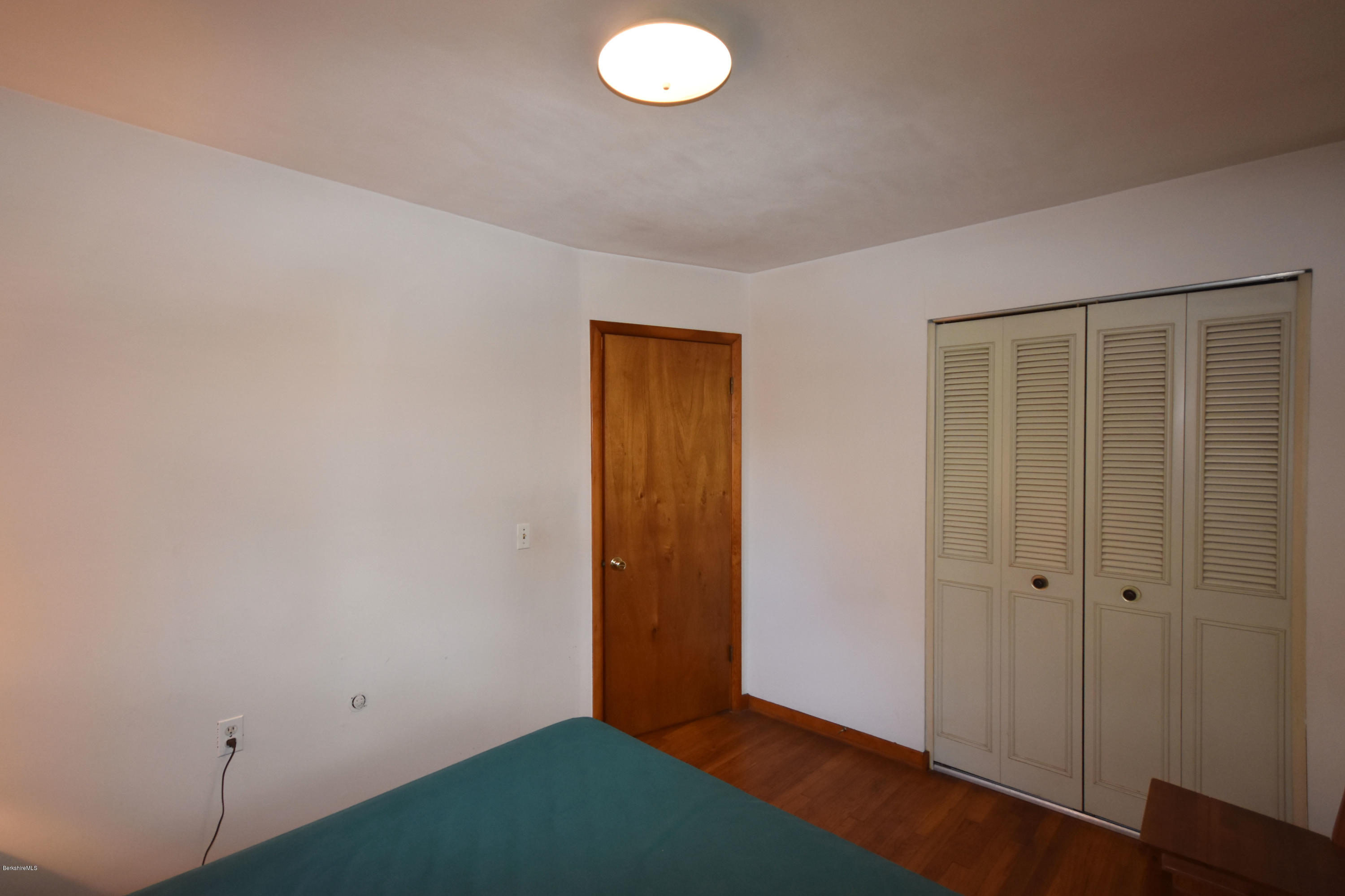 239 East Windsor Road Peru, MA 01235 - Photo 17 of 38 an empty room with windows