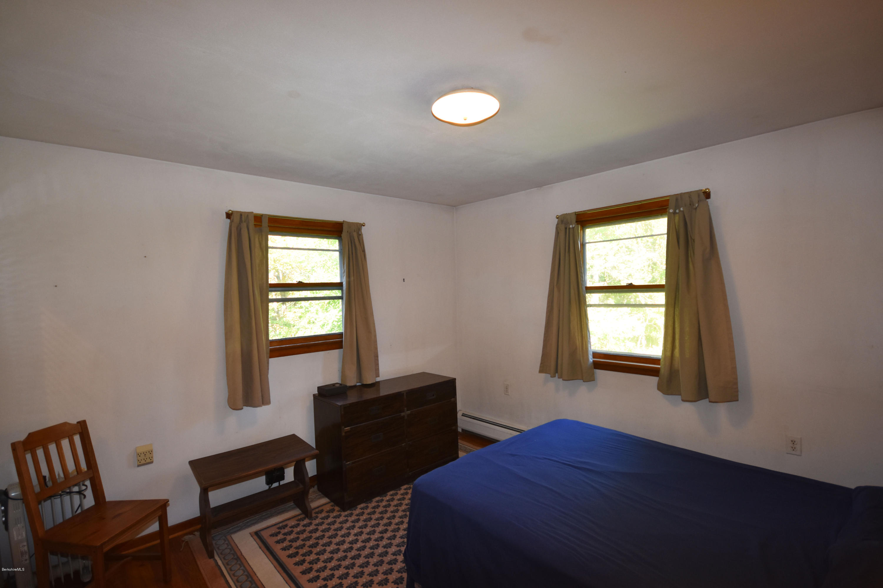 239 East Windsor Road Peru, MA 01235 - Photo 19 of 38 a bedroom with a bed and window