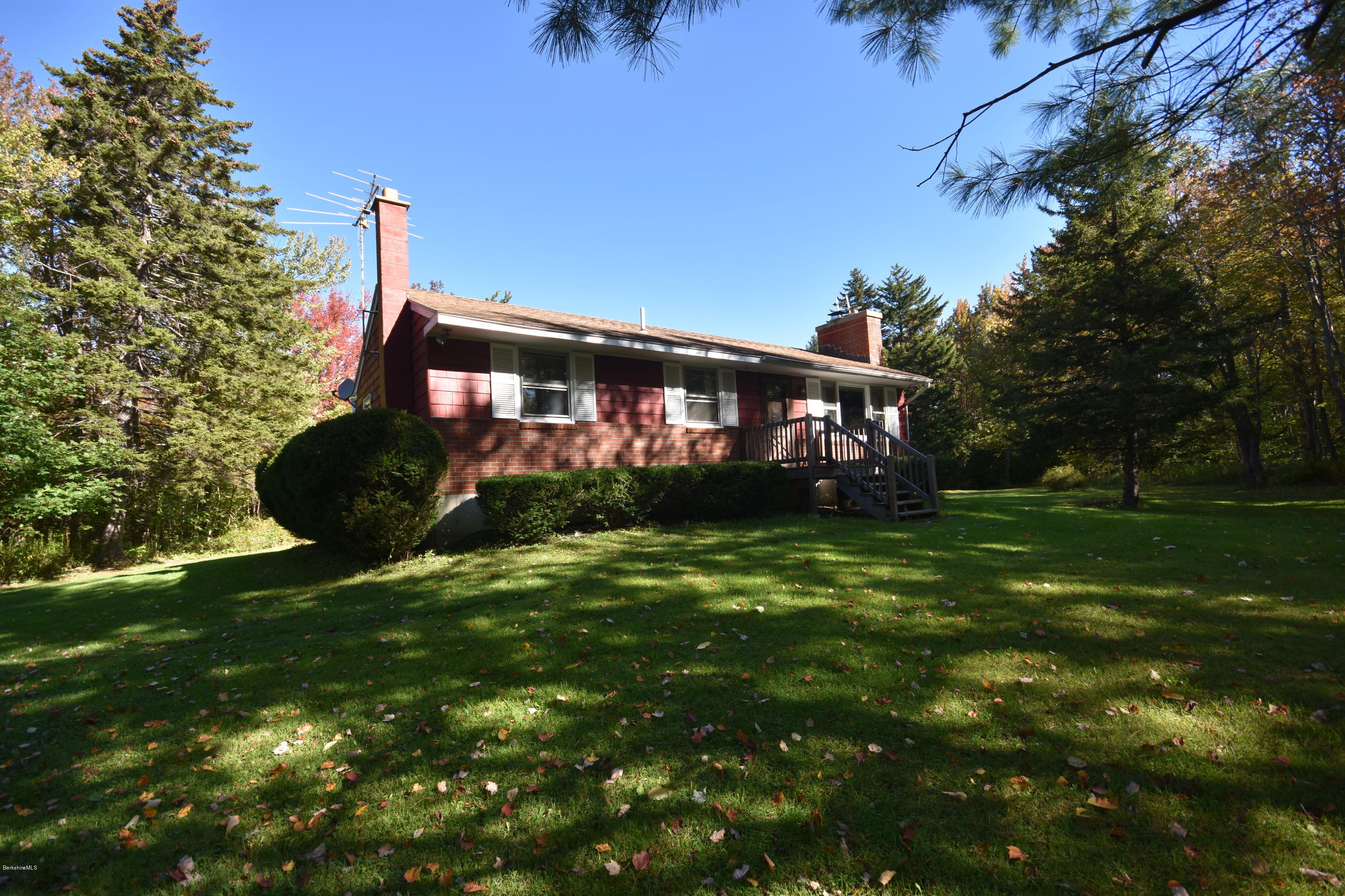 239 East Windsor Road Peru, MA 01235 - Photo 4 of 38 a front view of a house with garden