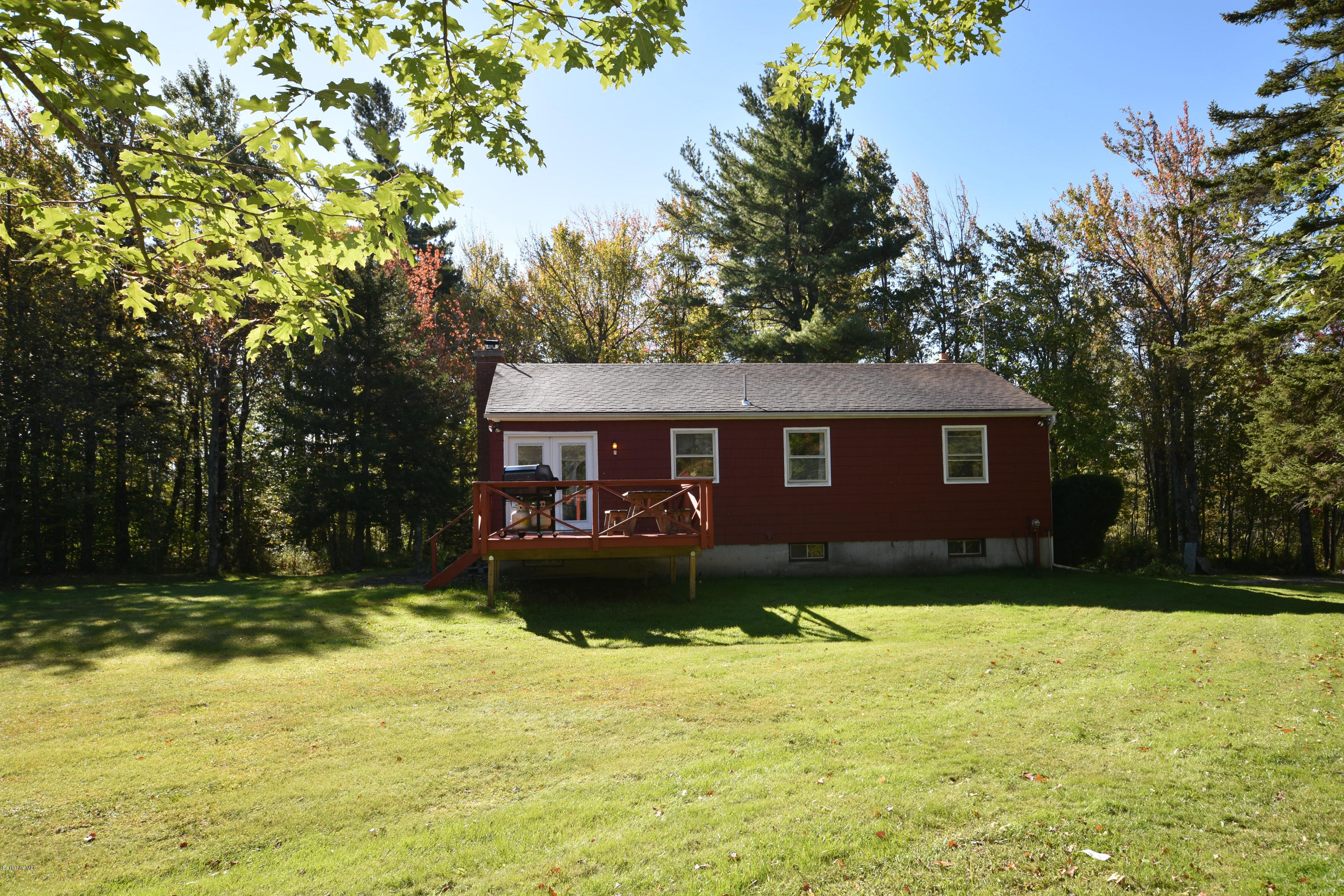 239 East Windsor Road Peru, MA 01235 - Photo 33 of 38 a view of a yard in front of a house with large tree