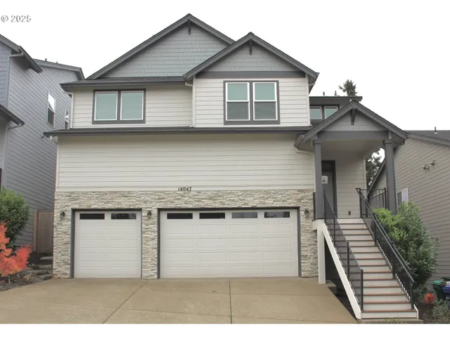 a view of a house with a garage