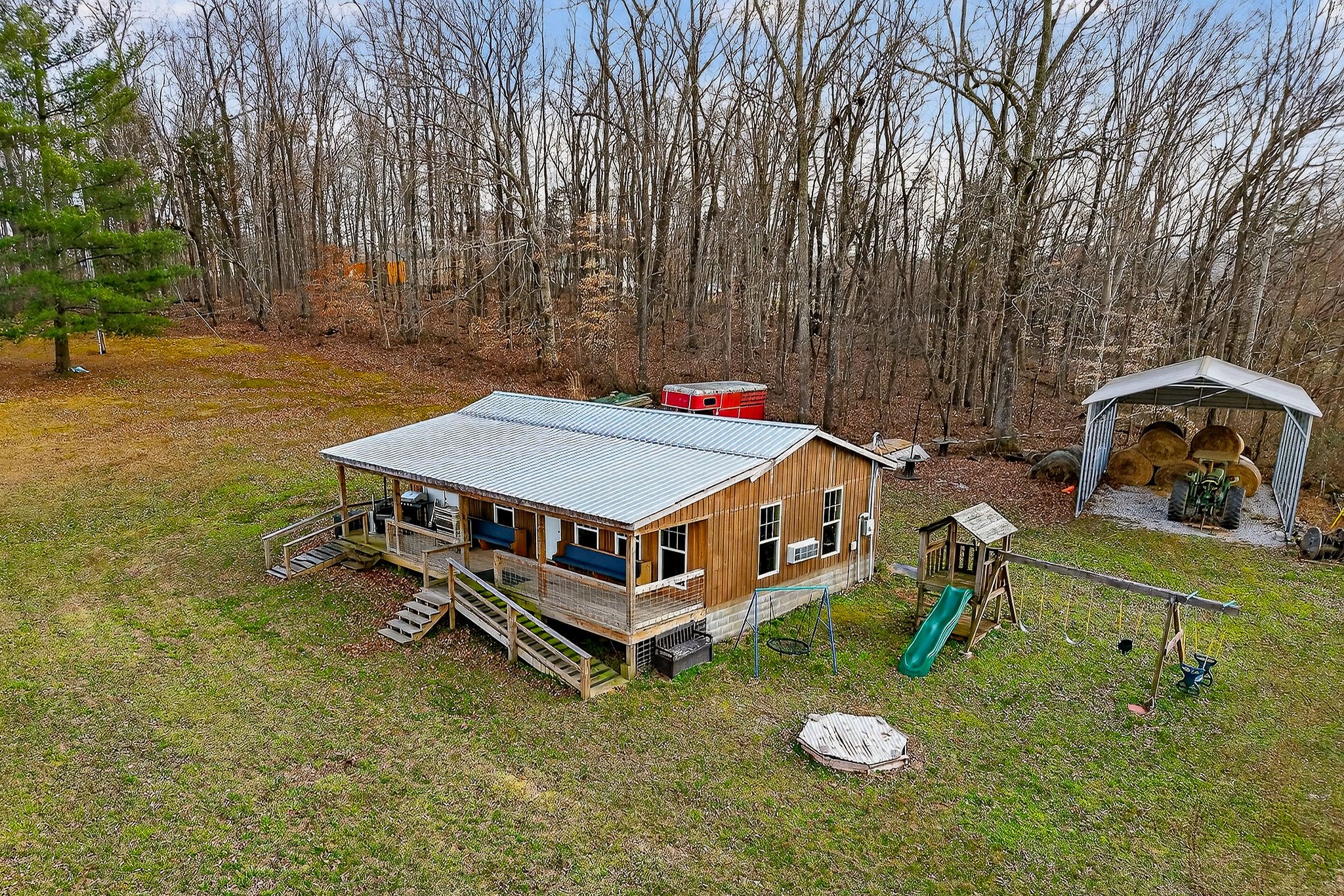 1680 Harrison Ferry Road McMinnville, TN 37110 - Photo 29 of 53 a small pool with some trees in the background