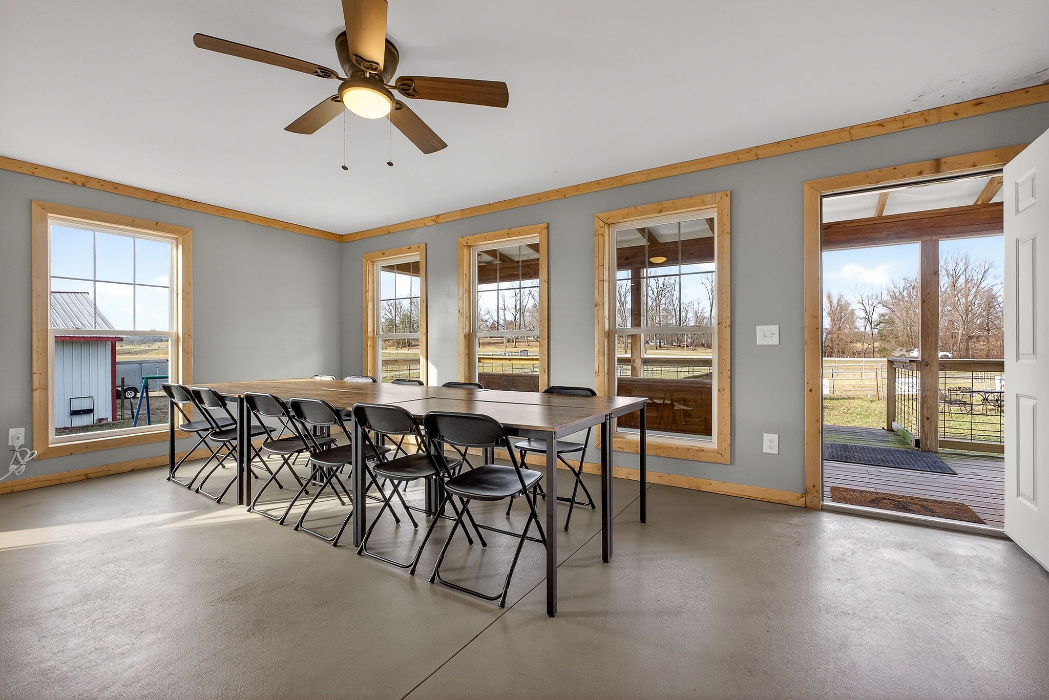 1680 Harrison Ferry Road McMinnville, TN 37110 - Photo 36 of 53 a dining room with furniture a chandelier and a rug