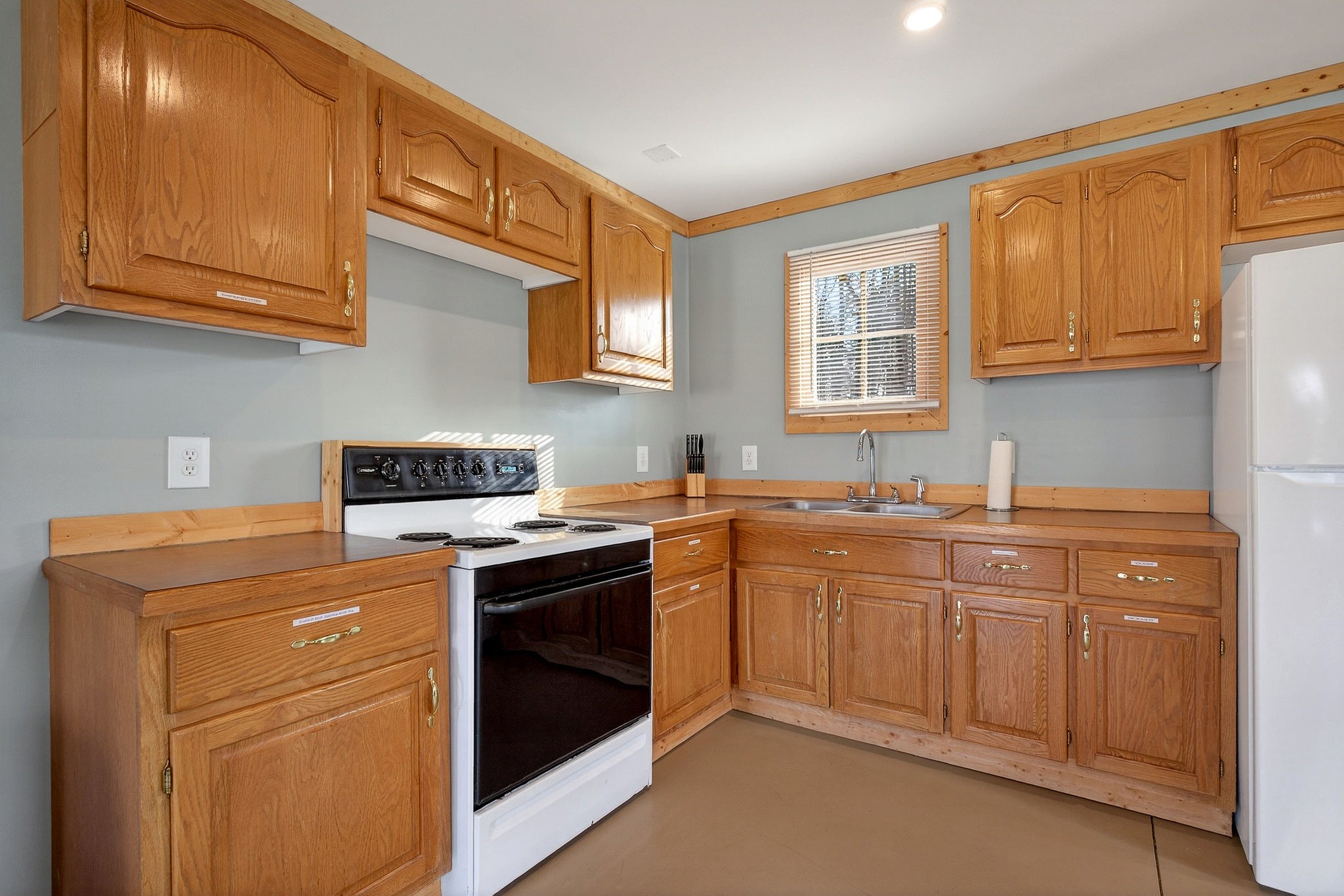 1680 Harrison Ferry Road McMinnville, TN 37110 - Photo 39 of 53 a kitchen with stainless steel appliances granite countertop a stove and a sink
