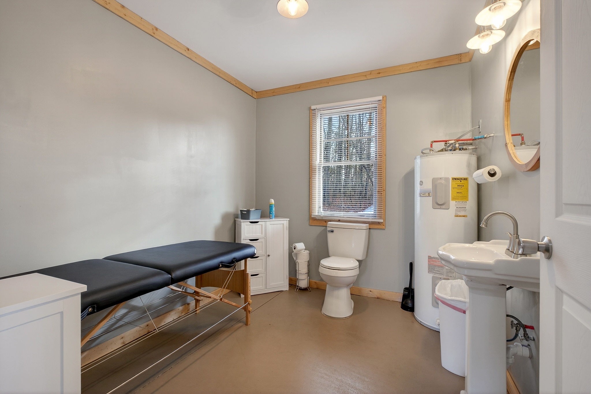 1680 Harrison Ferry Road McMinnville, TN 37110 - Photo 48 of 53 a bathroom with a sink a toilet and a mirror