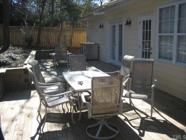 1114 Dogwood Lane Raleigh, NC 27607 - Photo 7 of 9 Large deck to accomodate outdoor dining and group gatherings.