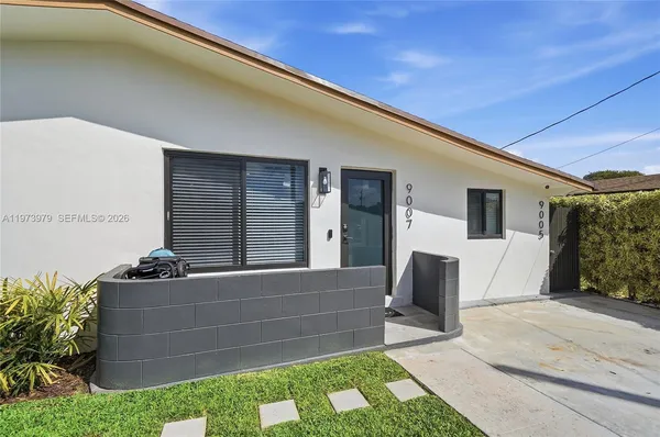a house view with a outdoor space