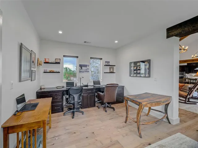 a workspace with furniture and a window