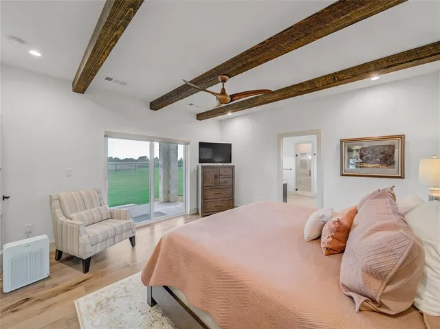 a bed room with a bed and a couch