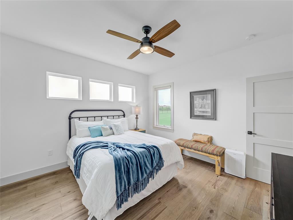 6362 Belz Road Sanger, TX 76266 - Photo 24 of 40 a bedroom with a bed and a window