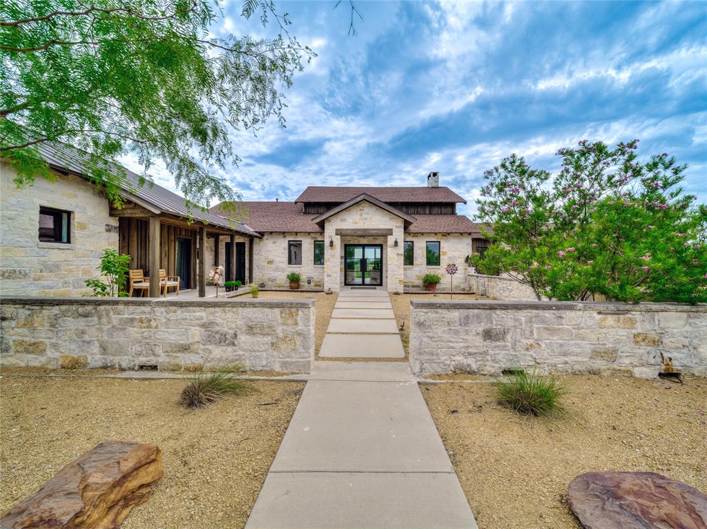 6362 Belz Road Sanger, TX 76266 - Photo 3 of 40 a front view of a house with a yard