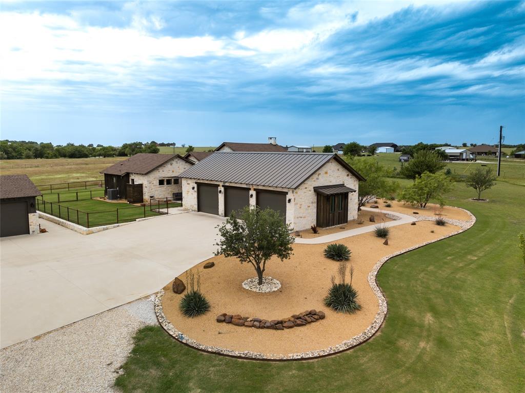 6362 Belz Road Sanger, TX 76266 - Photo 36 of 40 a view of a house with a yard