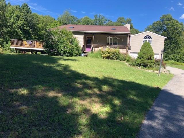 241 E Road Wallkill, NY 12589 - Photo 1 of 1 a view of a house with a garden