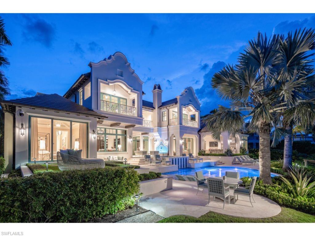 a view of a building with a backyard