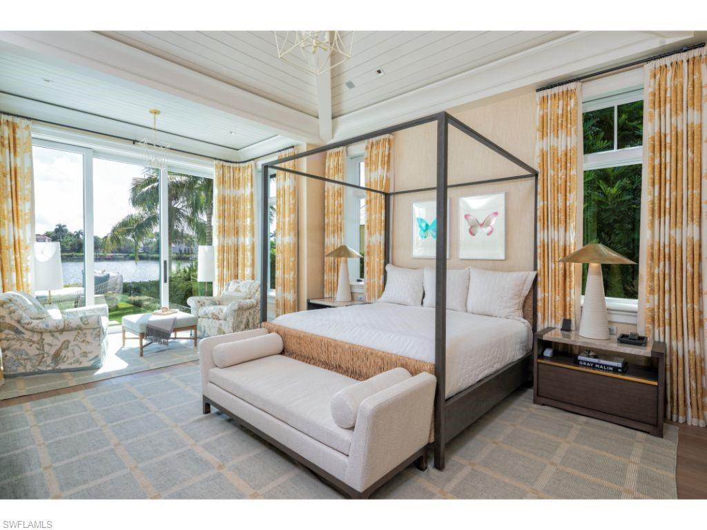 3401 Rum Row Naples, FL 34102 - Photo 12 of 22 a living room with furniture and large window
