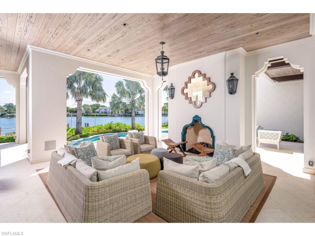 3401 Rum Row Naples, FL 34102 - Photo 17 of 22 a living room with furniture and a window