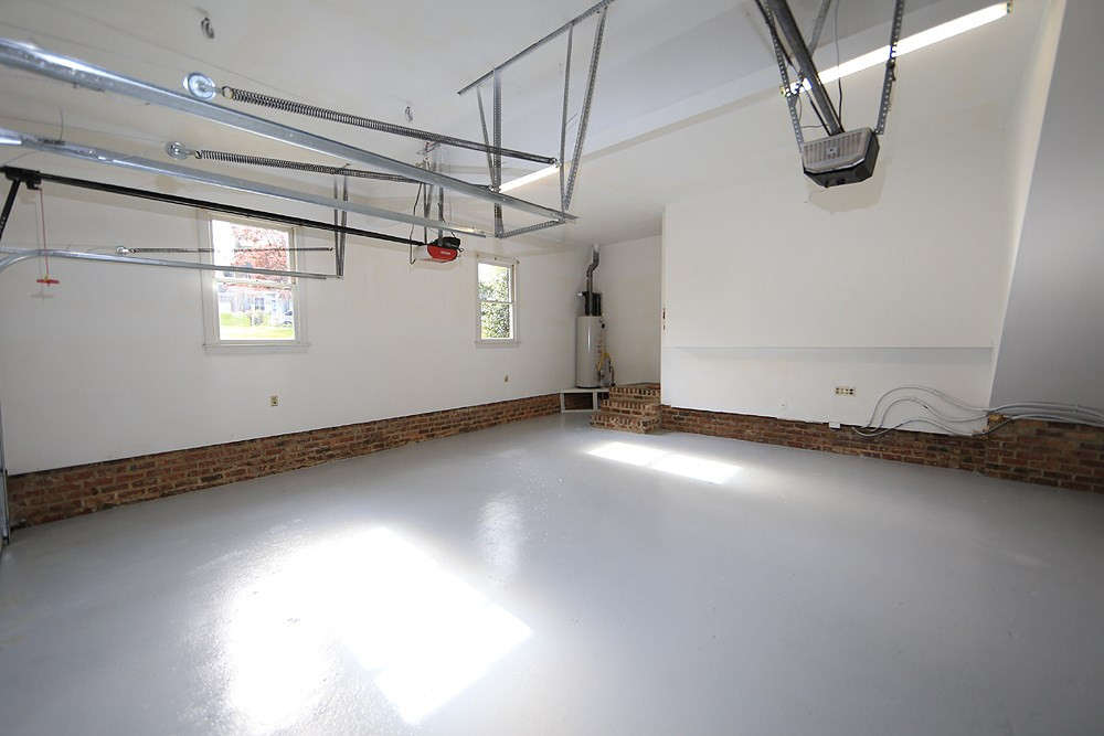 7809 Ketley Court Raleigh, NC 27615 - Photo 26 of 30 Even the garage is spotless here with new Epoxy Floor. 2 Car Garage