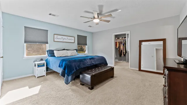 a view of a livingroom with furniture and closet