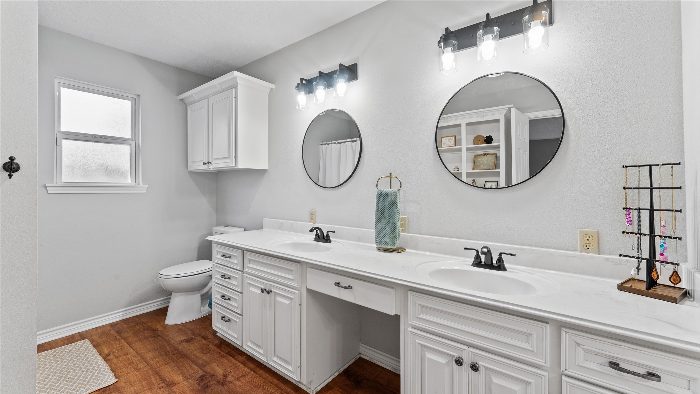 245 Alabama Point Livingston, TX 77351 - Photo 22 of 50 a bathroom with a double vanity sink and a mirror