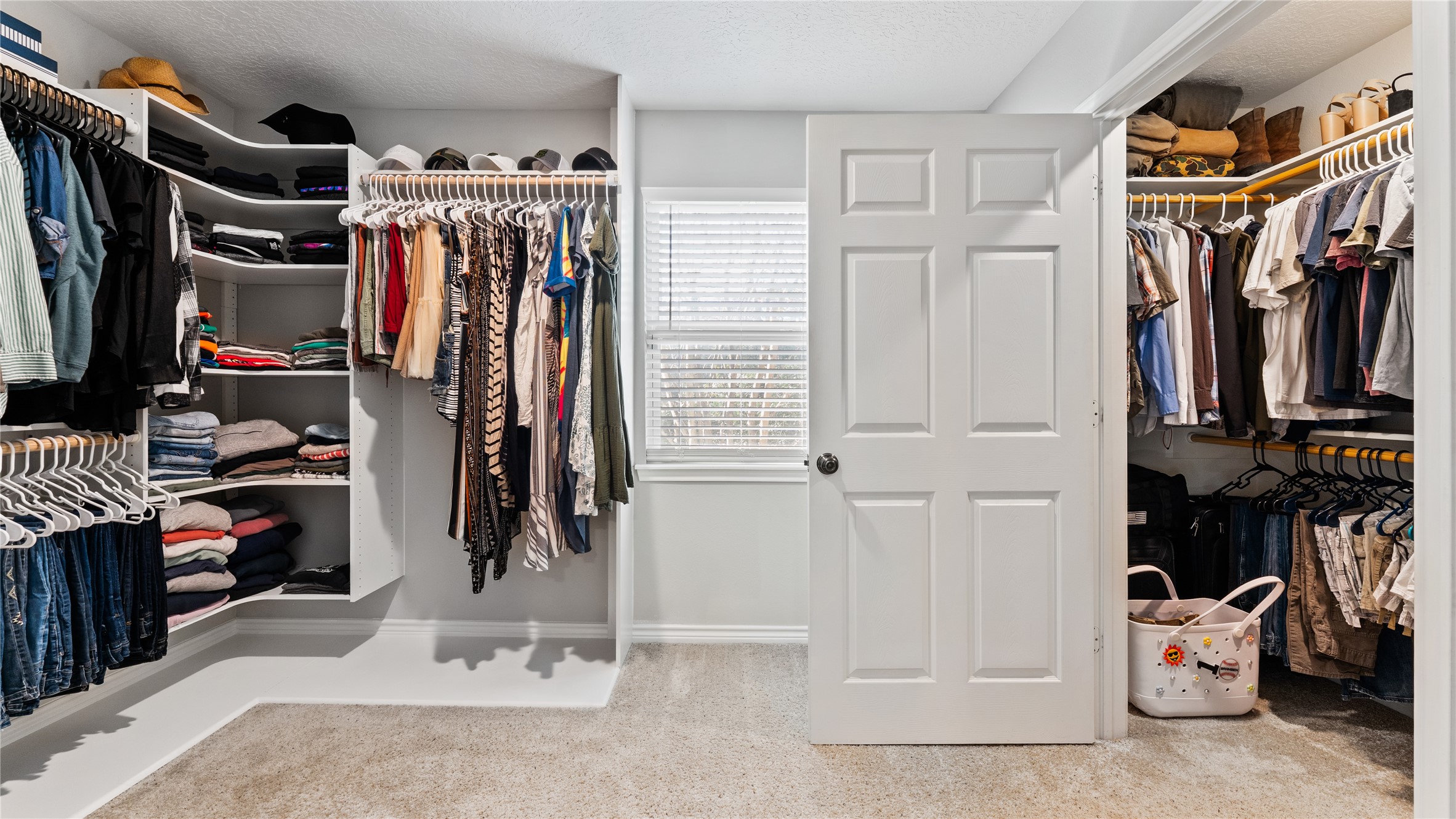245 Alabama Point Livingston, TX 77351 - Photo 25 of 50 a view of walk in closet with clothes and shoes