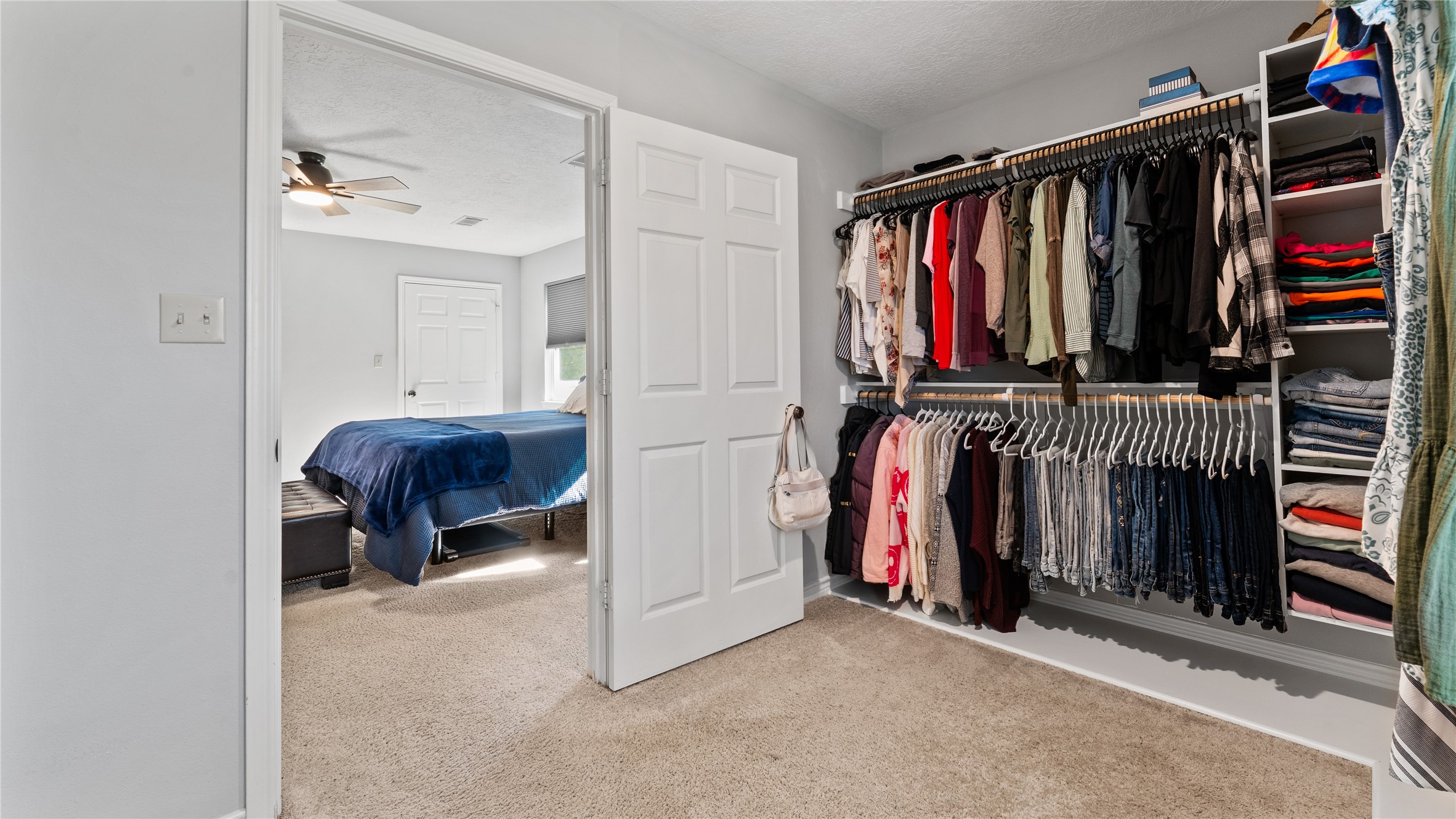 245 Alabama Point Livingston, TX 77351 - Photo 27 of 50 a view of walk in closet with clothes and shoes