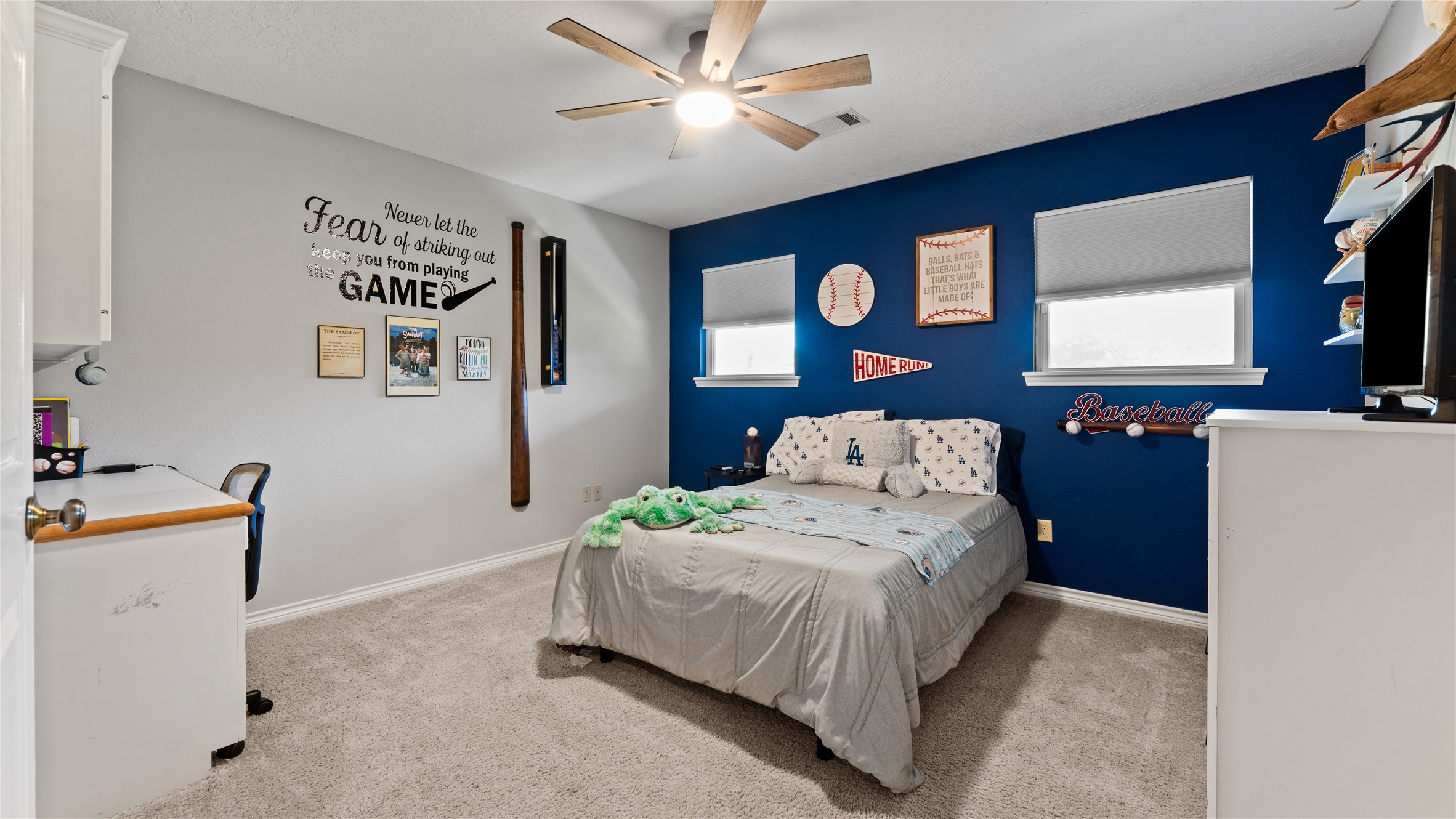 245 Alabama Point Livingston, TX 77351 - Photo 30 of 50 a bedroom with a bed and a flat screen tv