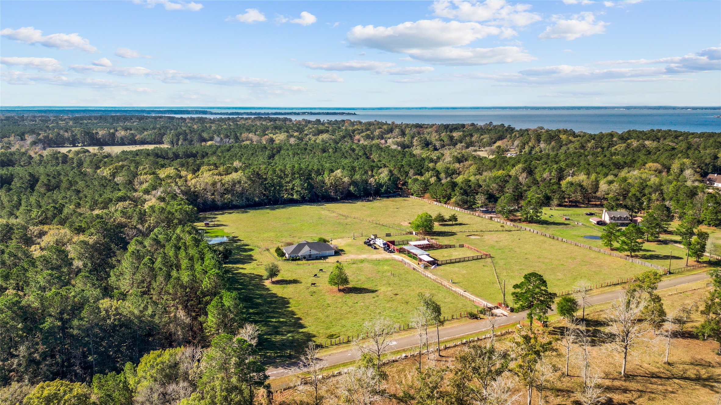 245 Alabama Point Livingston, TX 77351 - Photo 3 of 50 Aerial of property with Alabama Point Road in the foreground.