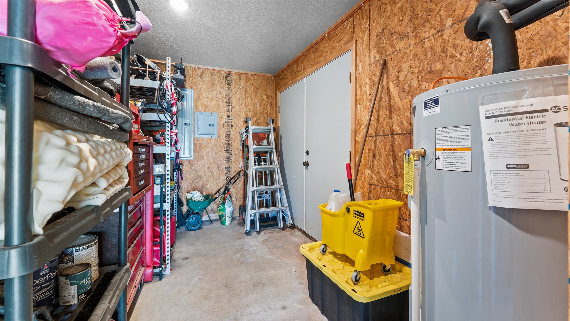 245 Alabama Point Livingston, TX 77351 - Photo 36 of 50 a view of walk in closet with clothes and shoes
