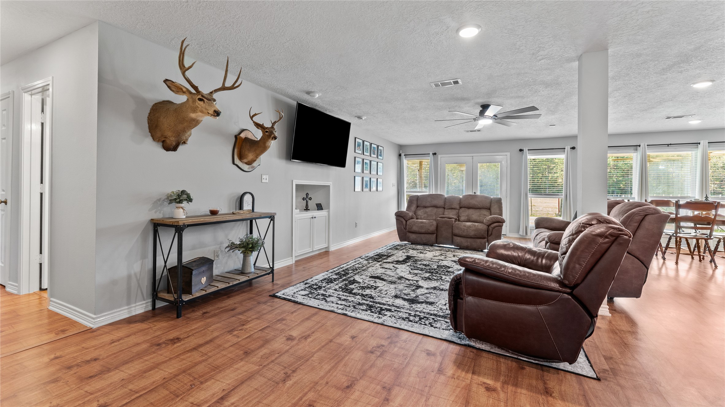 245 Alabama Point Livingston, TX 77351 - Photo 7 of 50 a living room with furniture and a flat screen tv