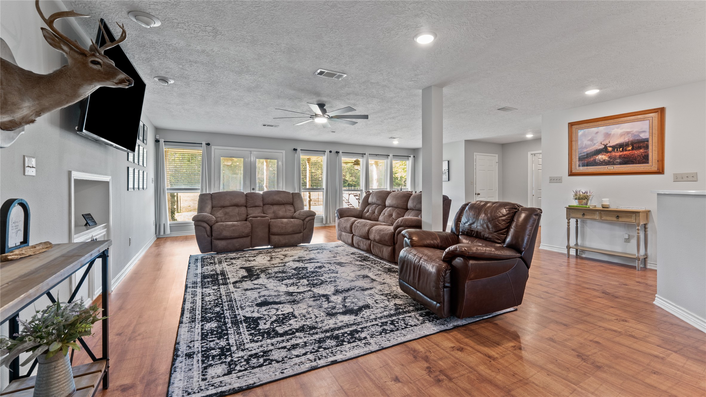 245 Alabama Point Livingston, TX 77351 - Photo 8 of 50 a living room with furniture and a flat screen tv