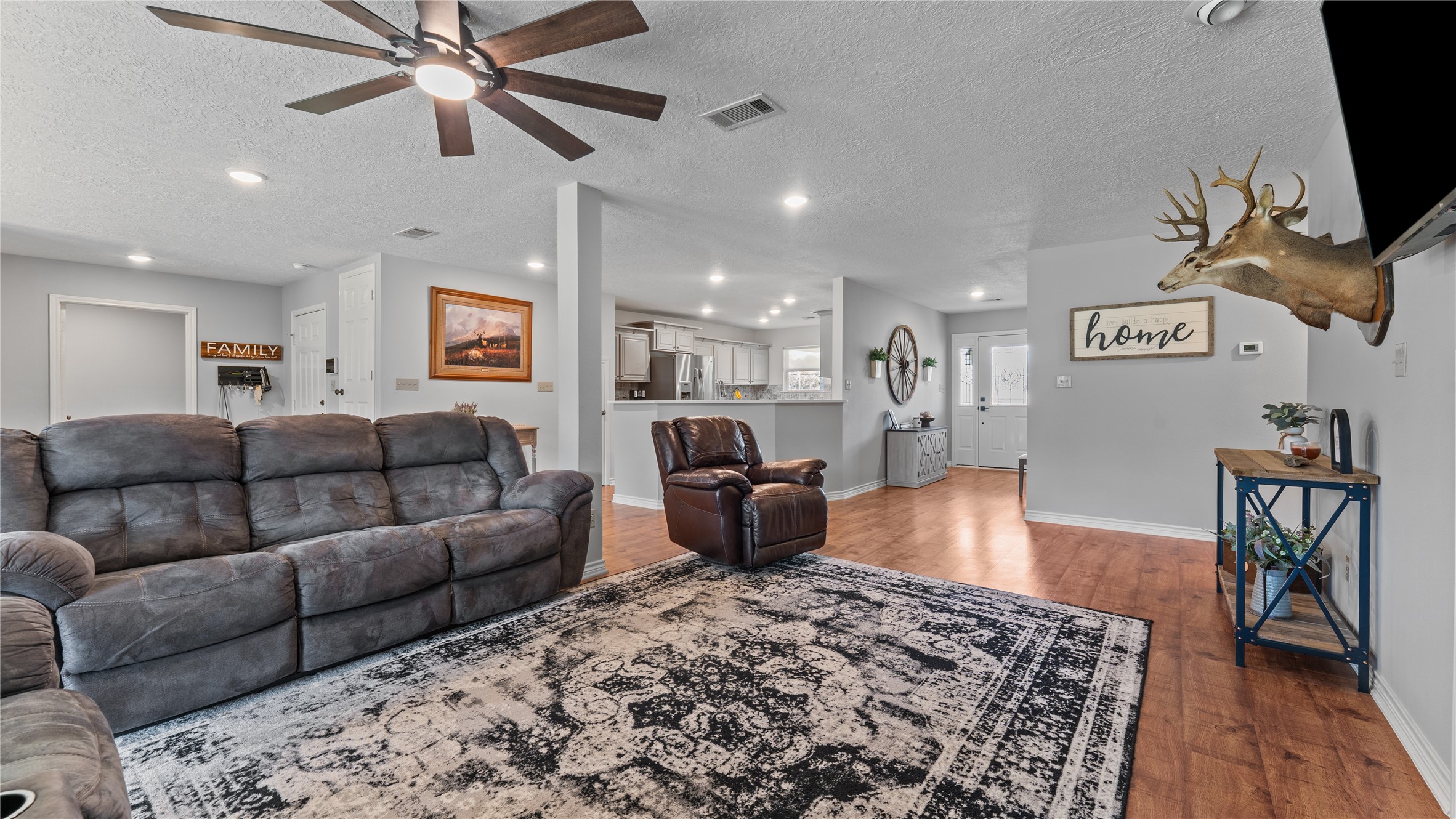 245 Alabama Point Livingston, TX 77351 - Photo 9 of 50 a living room with furniture and a flat screen tv