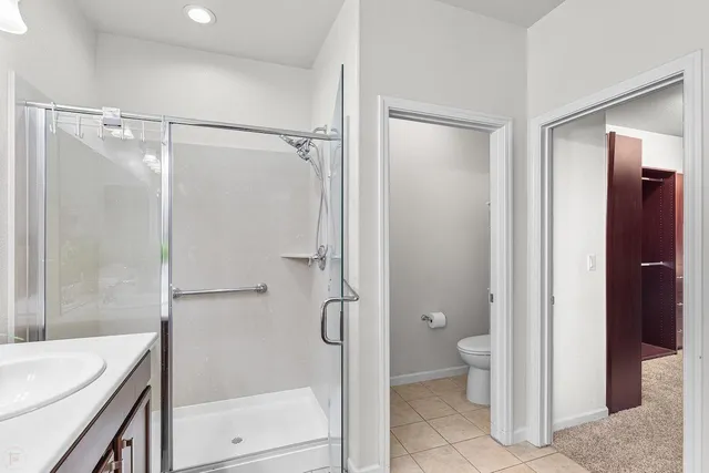 a view of a table and chairs in the garden