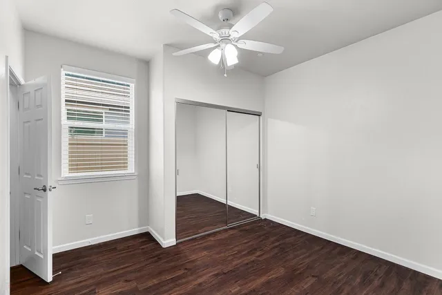 a view of swimming pool with outdoor seating and yard in back