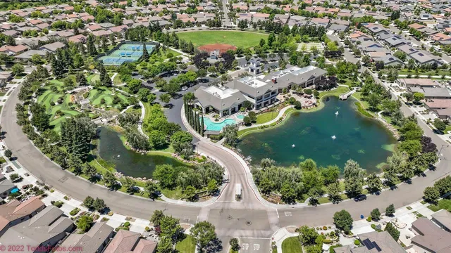 a view of a lake with a yard