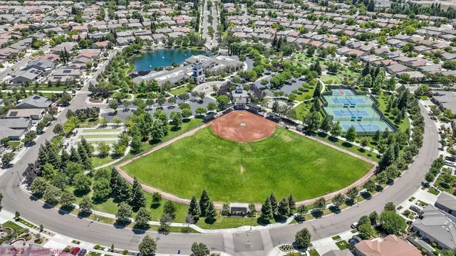 a view of a chairs and table in a patio