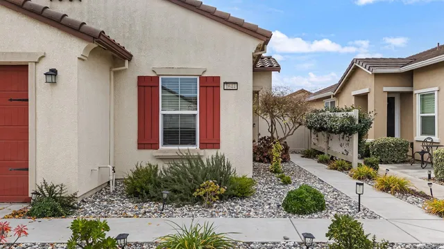 a view of a dining room with furniture kitchen and wooden floor