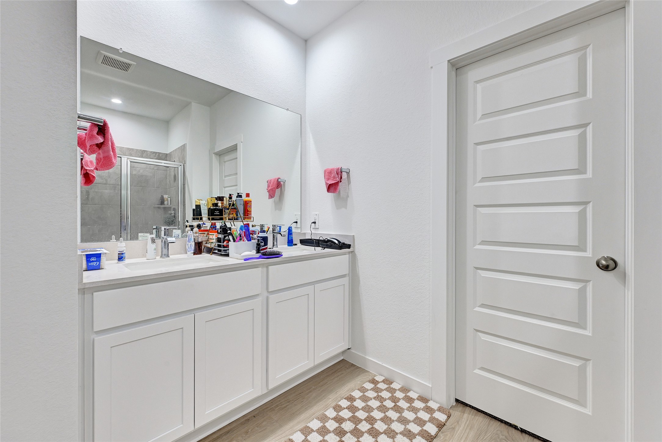 31703 Theodore Bend Drive Fulshear, TX 77441 - Photo 16 of 24 a bathroom with a sink and a mirror