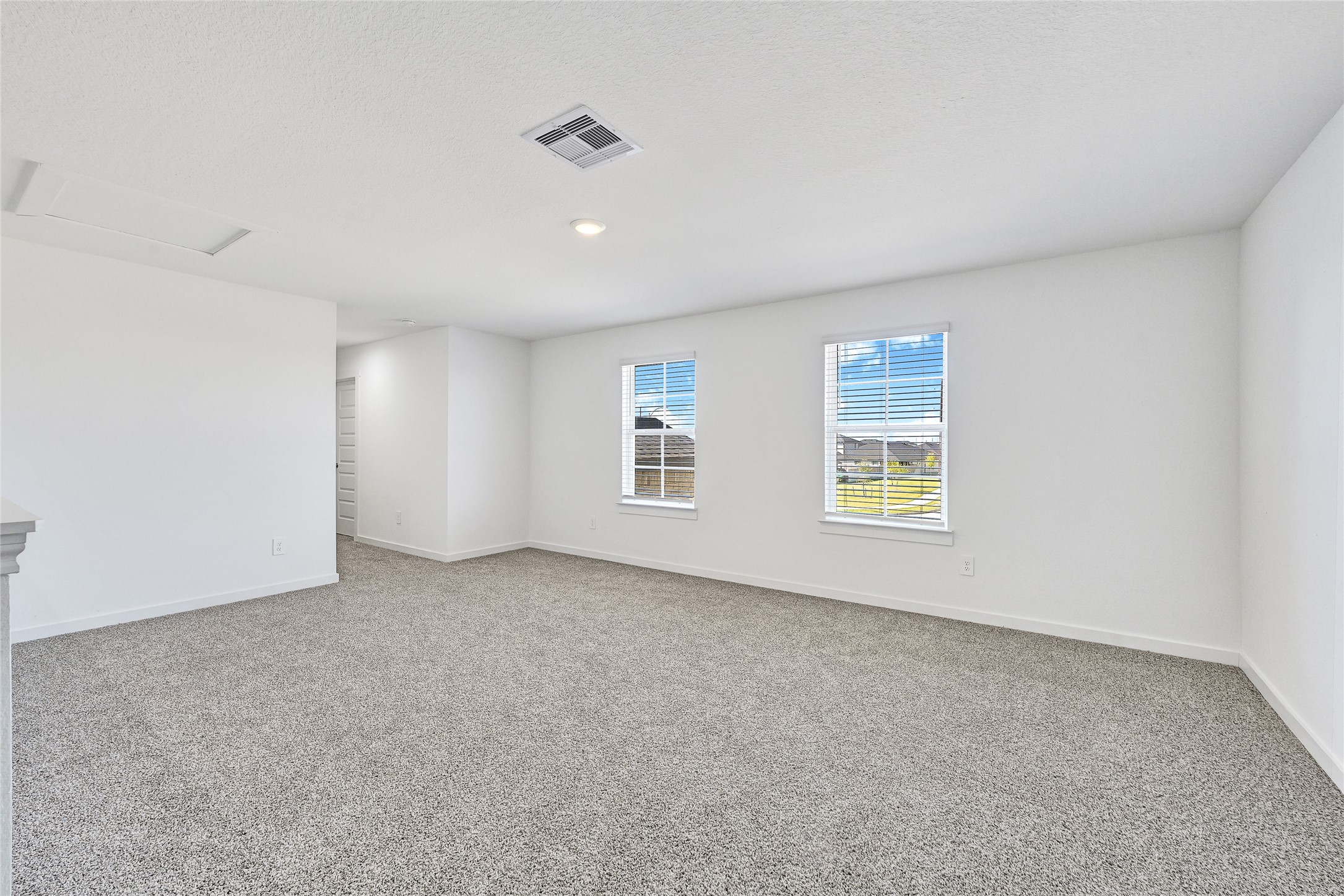 31703 Theodore Bend Drive Fulshear, TX 77441 - Photo 19 of 24 a view of an empty room with a window