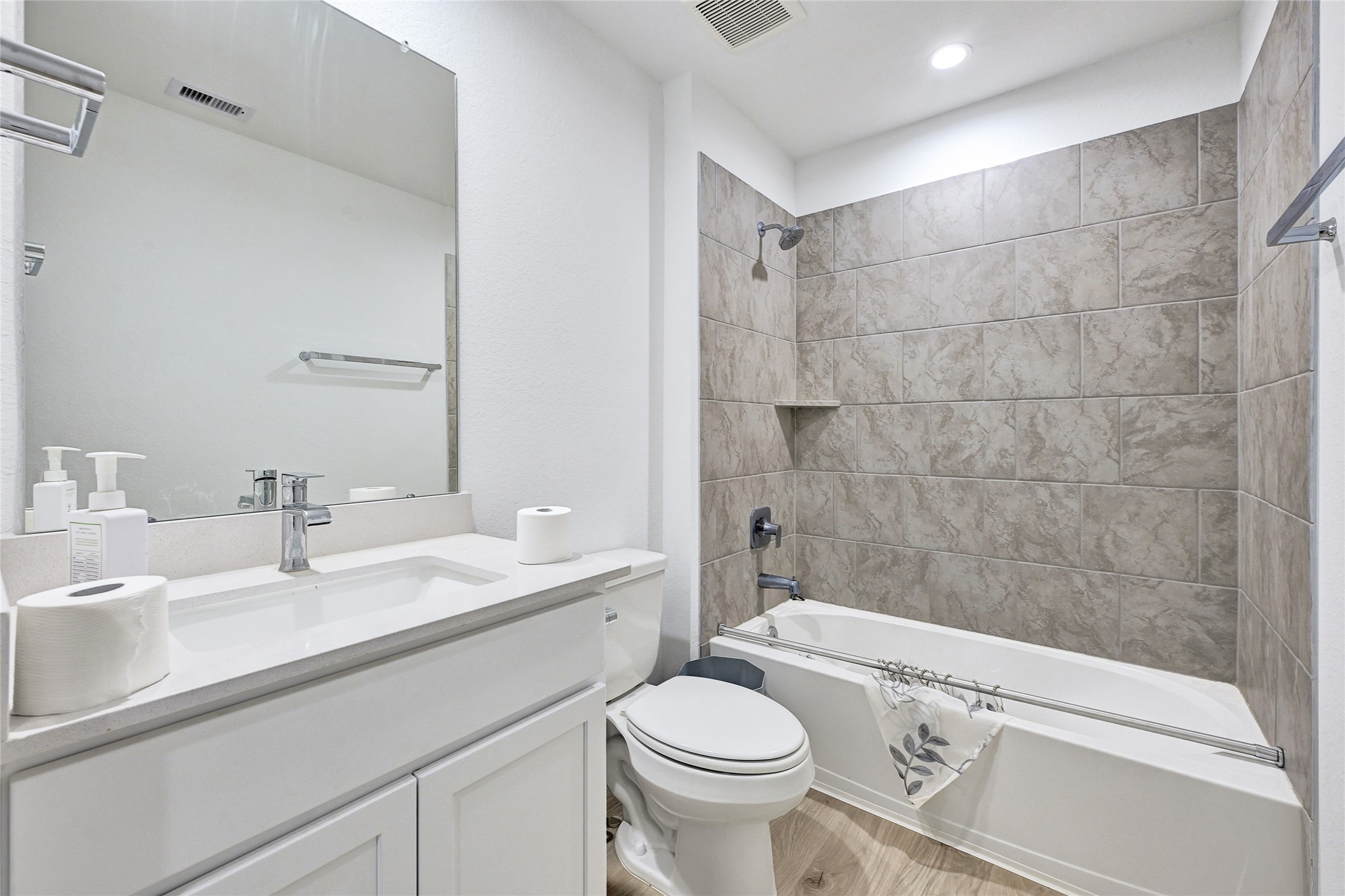 31703 Theodore Bend Drive Fulshear, TX 77441 - Photo 20 of 24 a bathroom with a sink toilet and shower
