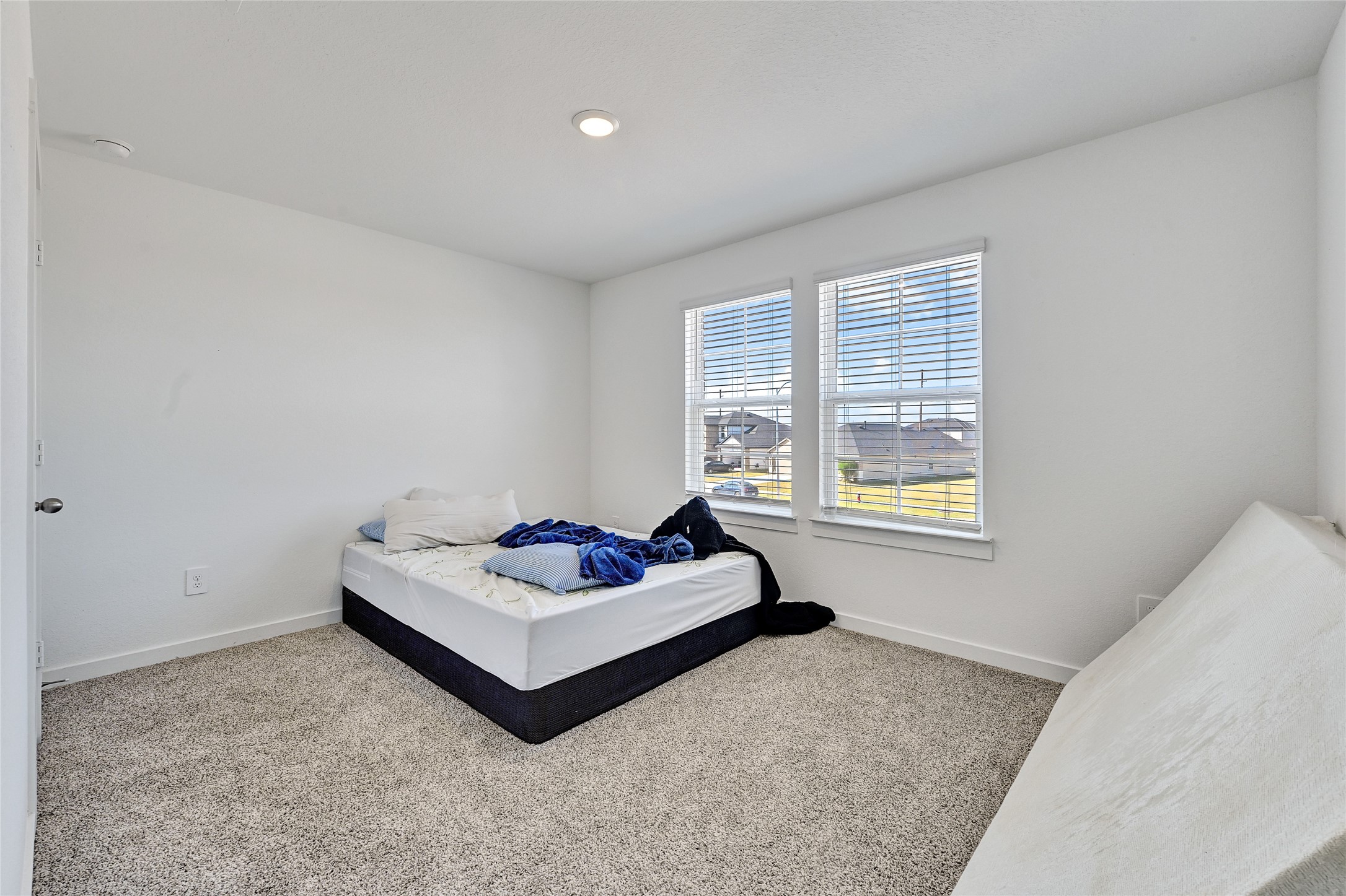 31703 Theodore Bend Drive Fulshear, TX 77441 - Photo 22 of 24 a living room with furniture and a window