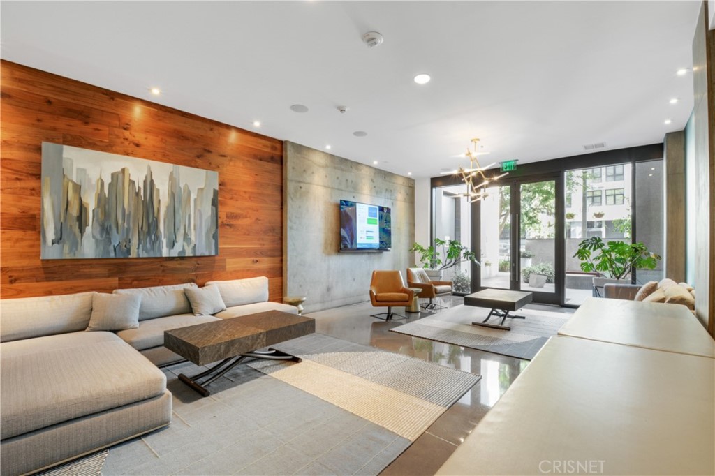 1111 South Grand Avenue, Unit 617 Los Angeles, CA 90015 - Photo 1 of 20 a living room with furniture and floor to ceiling window