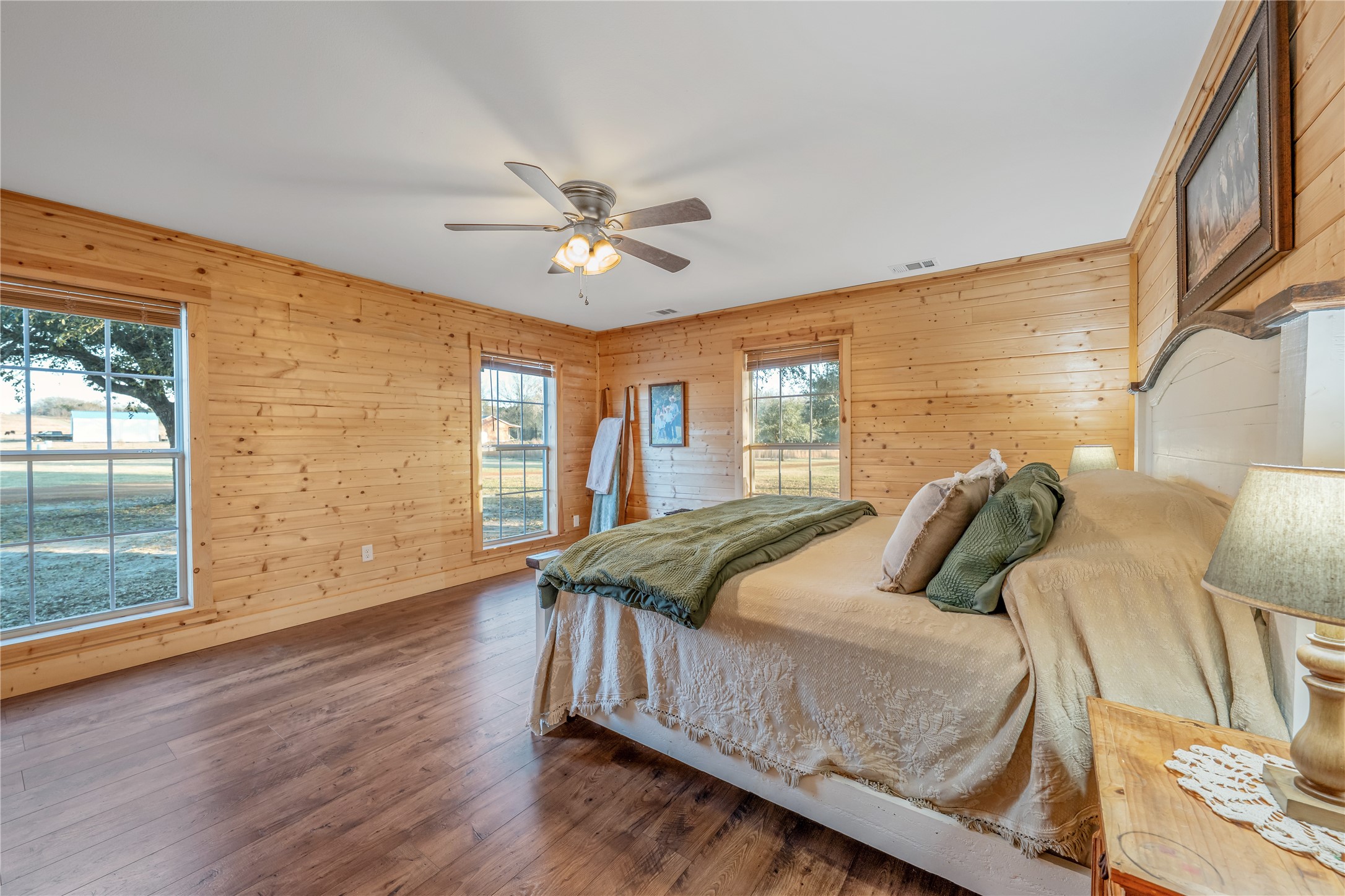 6751 County Road 4710 Larue, TX 75770 - Photo 15 of 47 a bedroom with a bed and wooden floor
