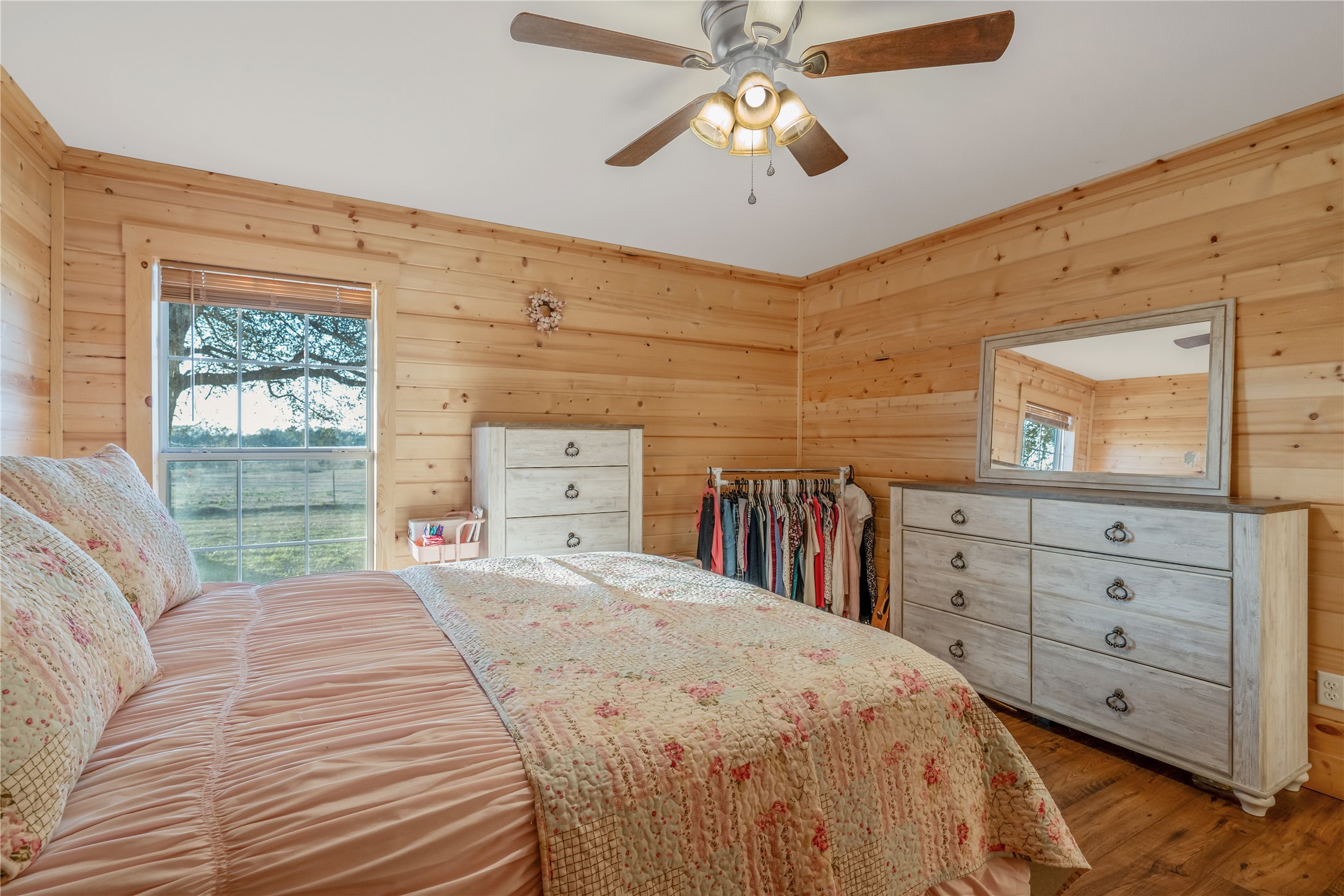 6751 County Road 4710 Larue, TX 75770 - Photo 18 of 47 a bedroom with a large bed and a large dresser