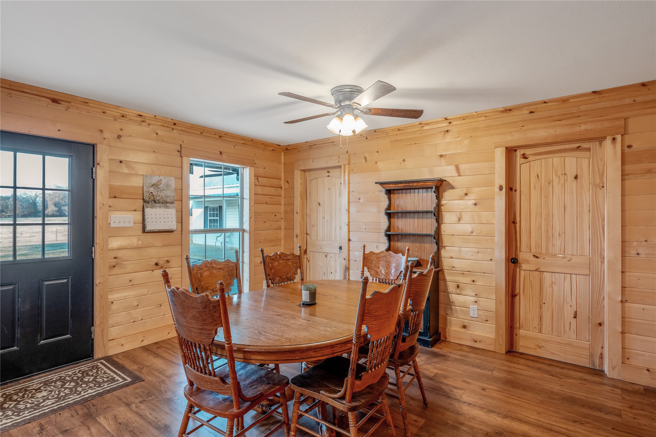 6751 County Road 4710 Larue, TX 75770 - Photo 25 of 47 a view of a dining room with furniture window and wooden floor