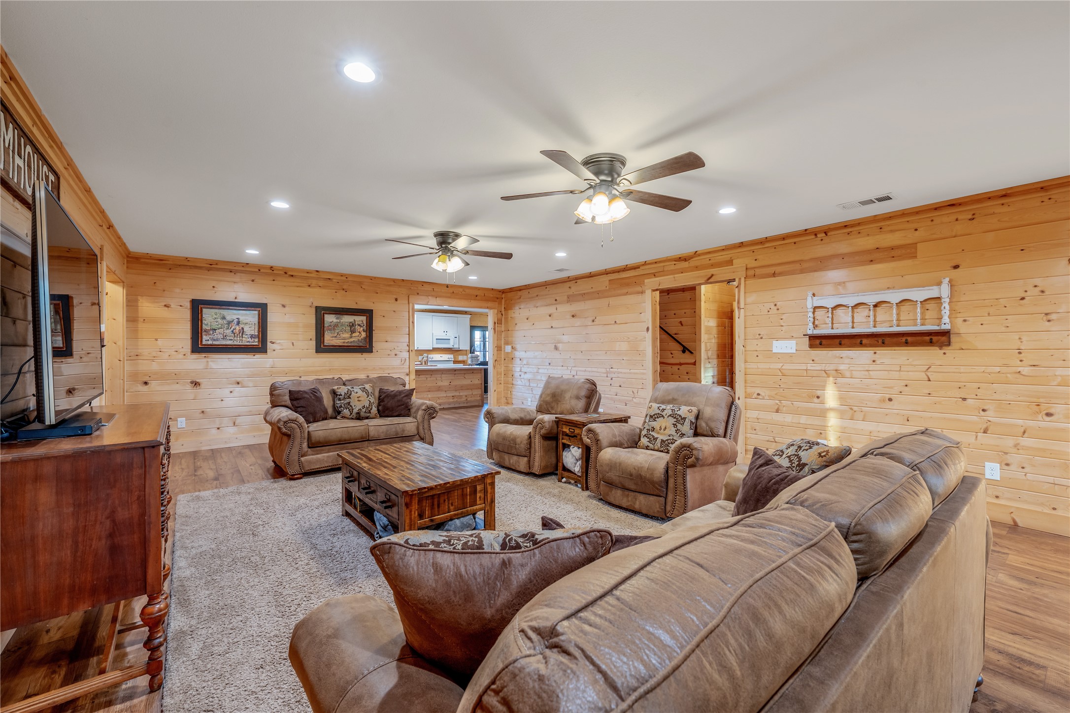 6751 County Road 4710 Larue, TX 75770 - Photo 34 of 47 a living room with furniture ceiling fan and a rug
