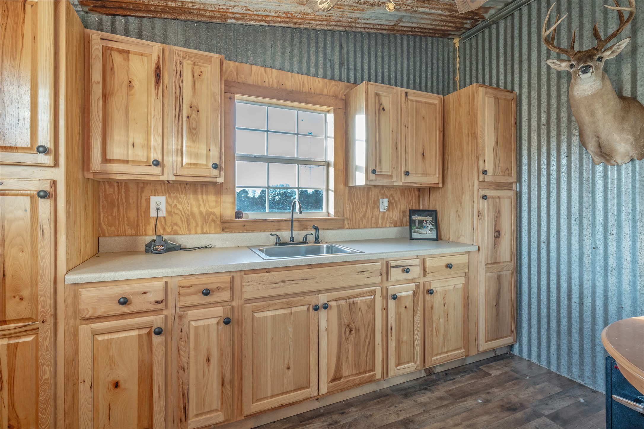 6751 County Road 4710 Larue, TX 75770 - Photo 38 of 47 a kitchen with stainless steel appliances granite countertop a sink and a cabinets