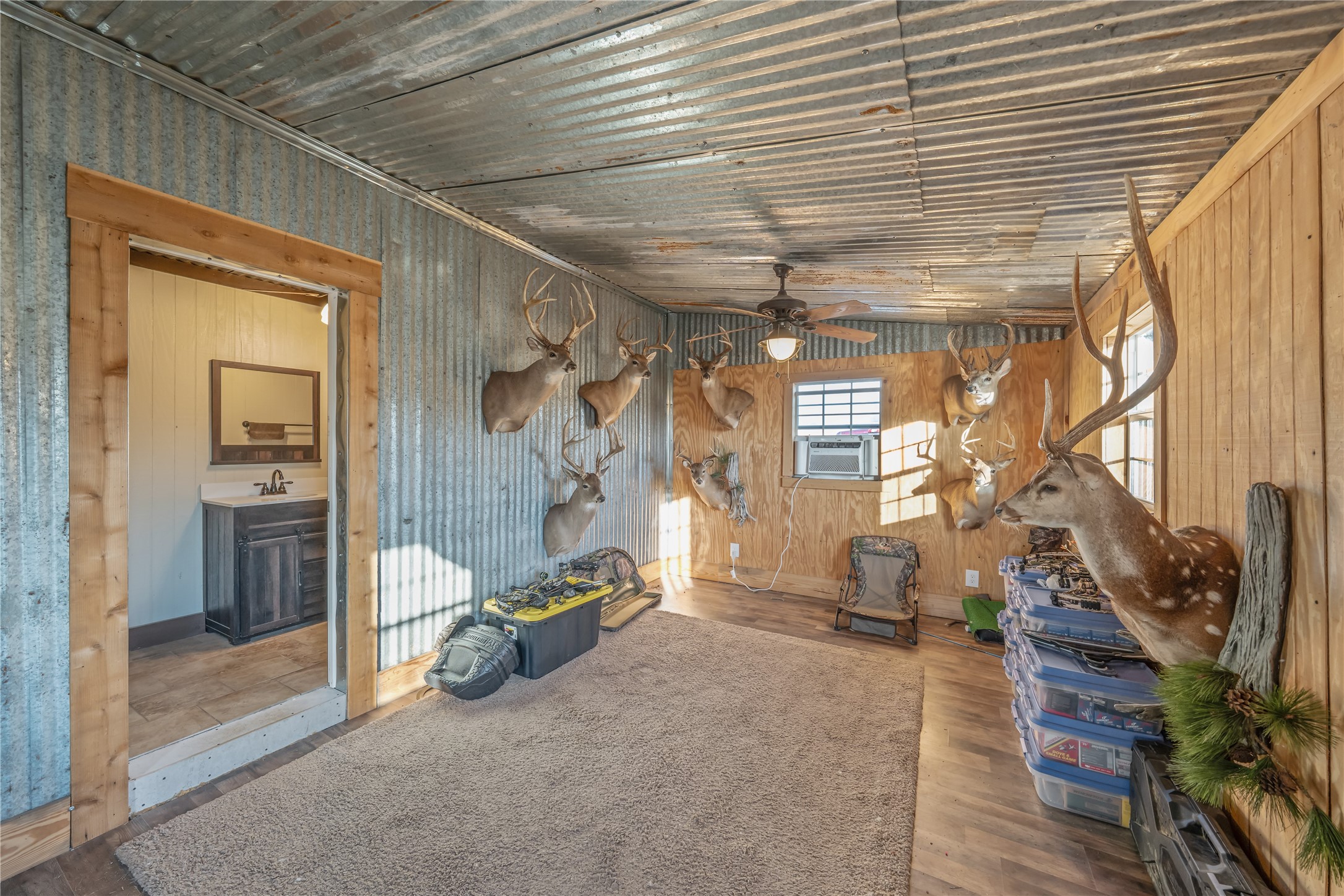 6751 County Road 4710 Larue, TX 75770 - Photo 39 of 47 a view of a livingroom with wooden floor and a couch