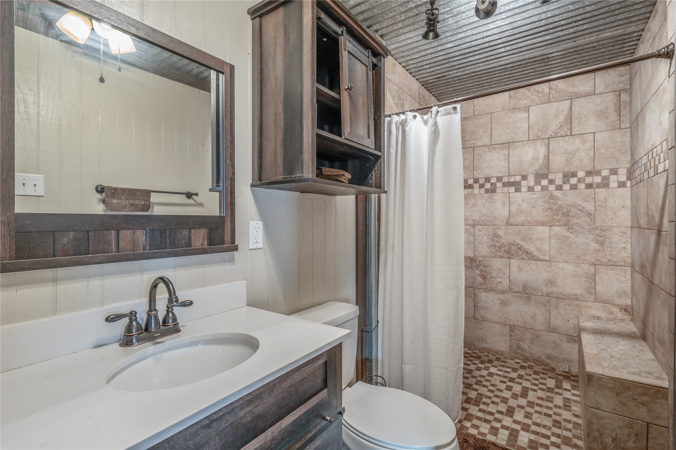 6751 County Road 4710 Larue, TX 75770 - Photo 40 of 47 a bathroom with a sink toilet and shower
