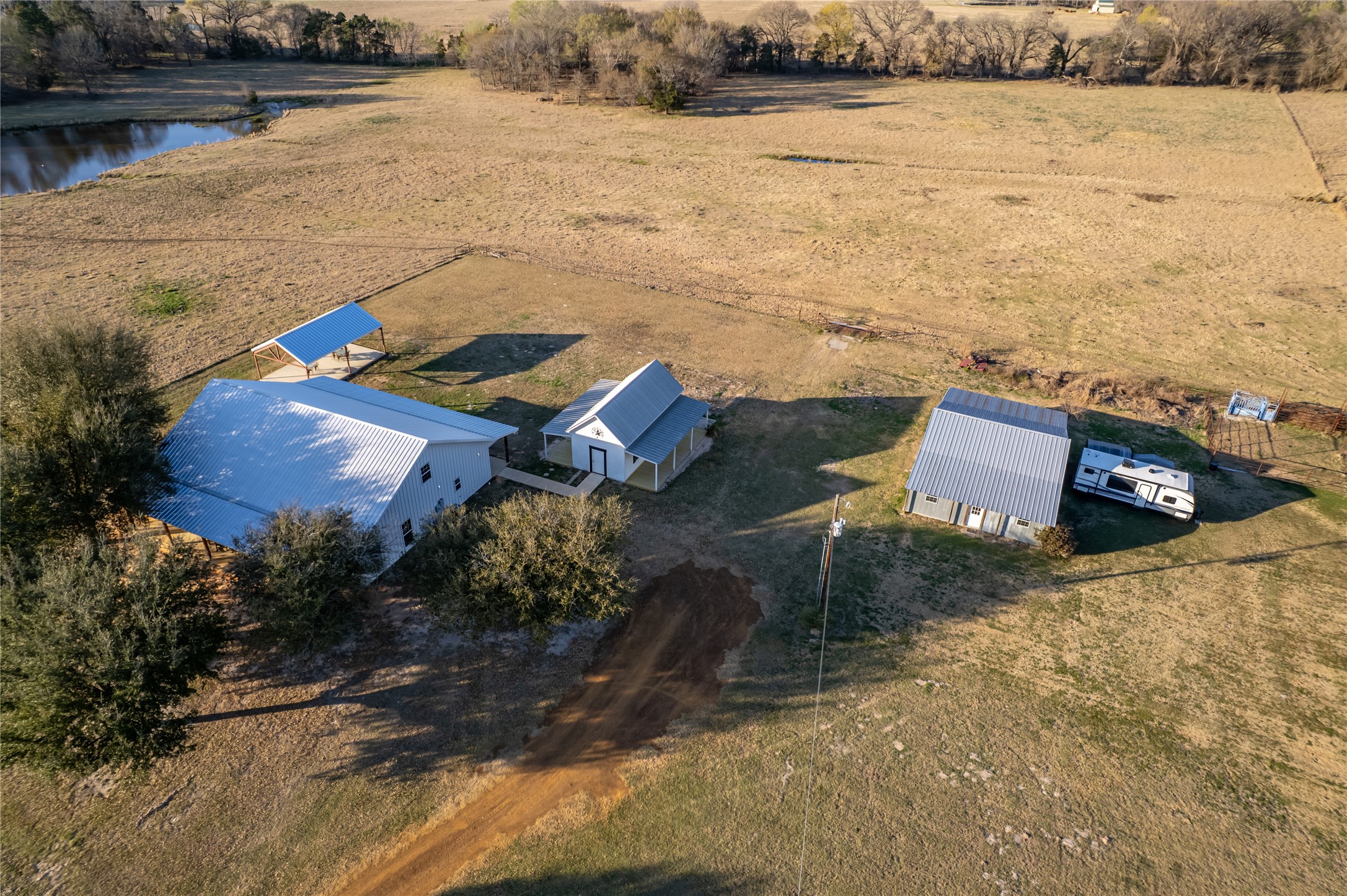 6751 County Road 4710 Larue, TX 75770 - Photo 4 of 47 an aerial view of house with yard swimming pool and outdoor seating