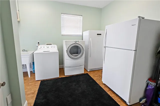 a utility room with dryer and washer